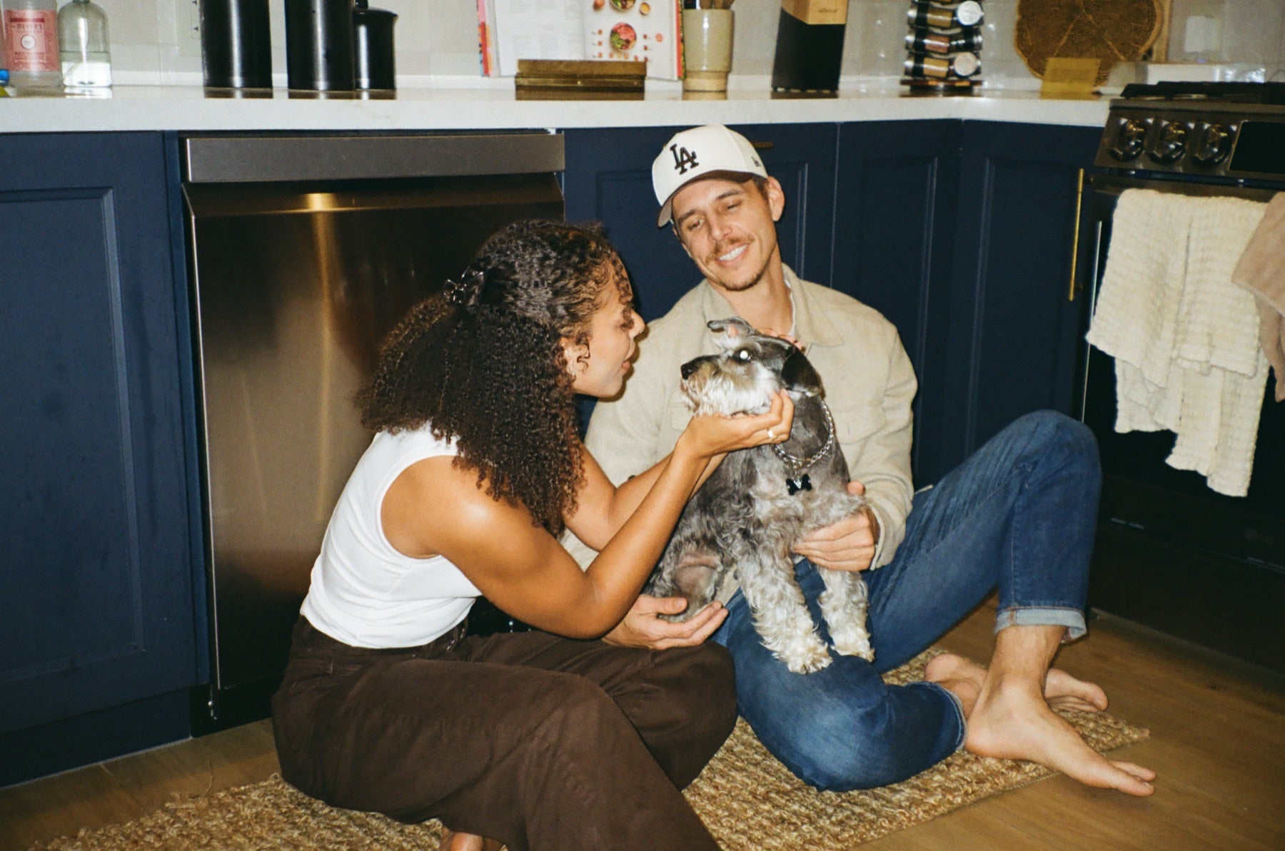 Raw Dawg founders Blake and Sierra outdoors with Bo